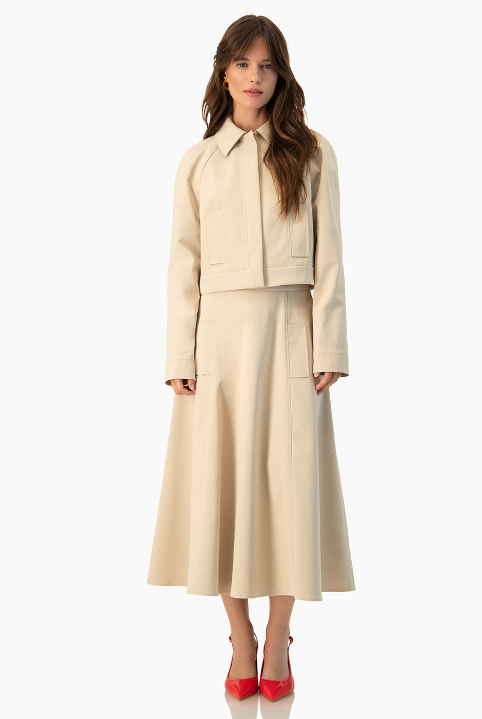 Falda midi beige Ivonne con bolsillos simulados