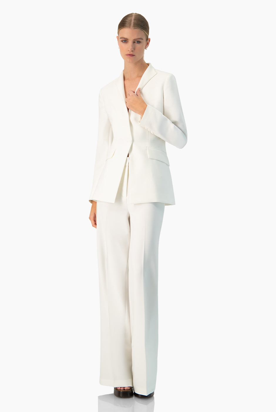 Pantalón recto blanco de pierna ancha sin bolsillos