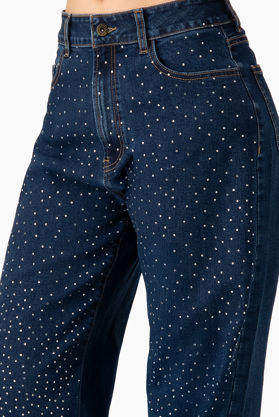 Jeans amplios azules con pedrería y bolsillos de parche