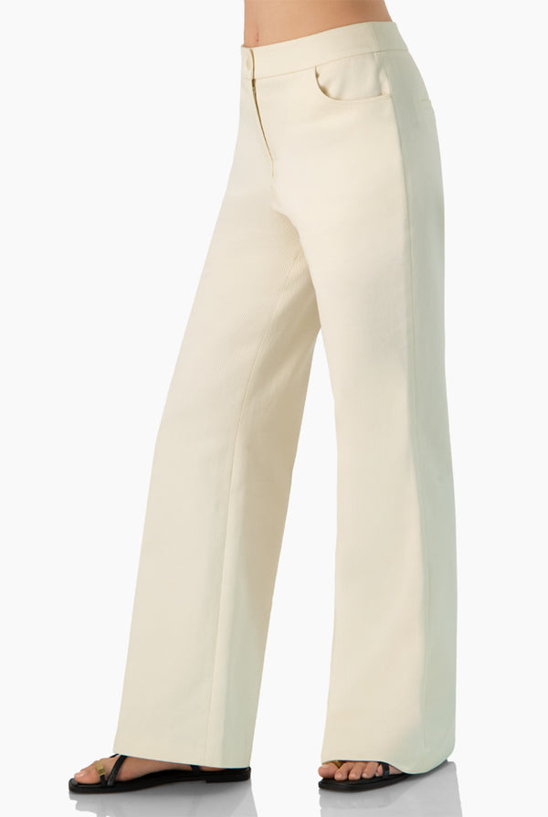 Pantalon marfil de pierna ancha