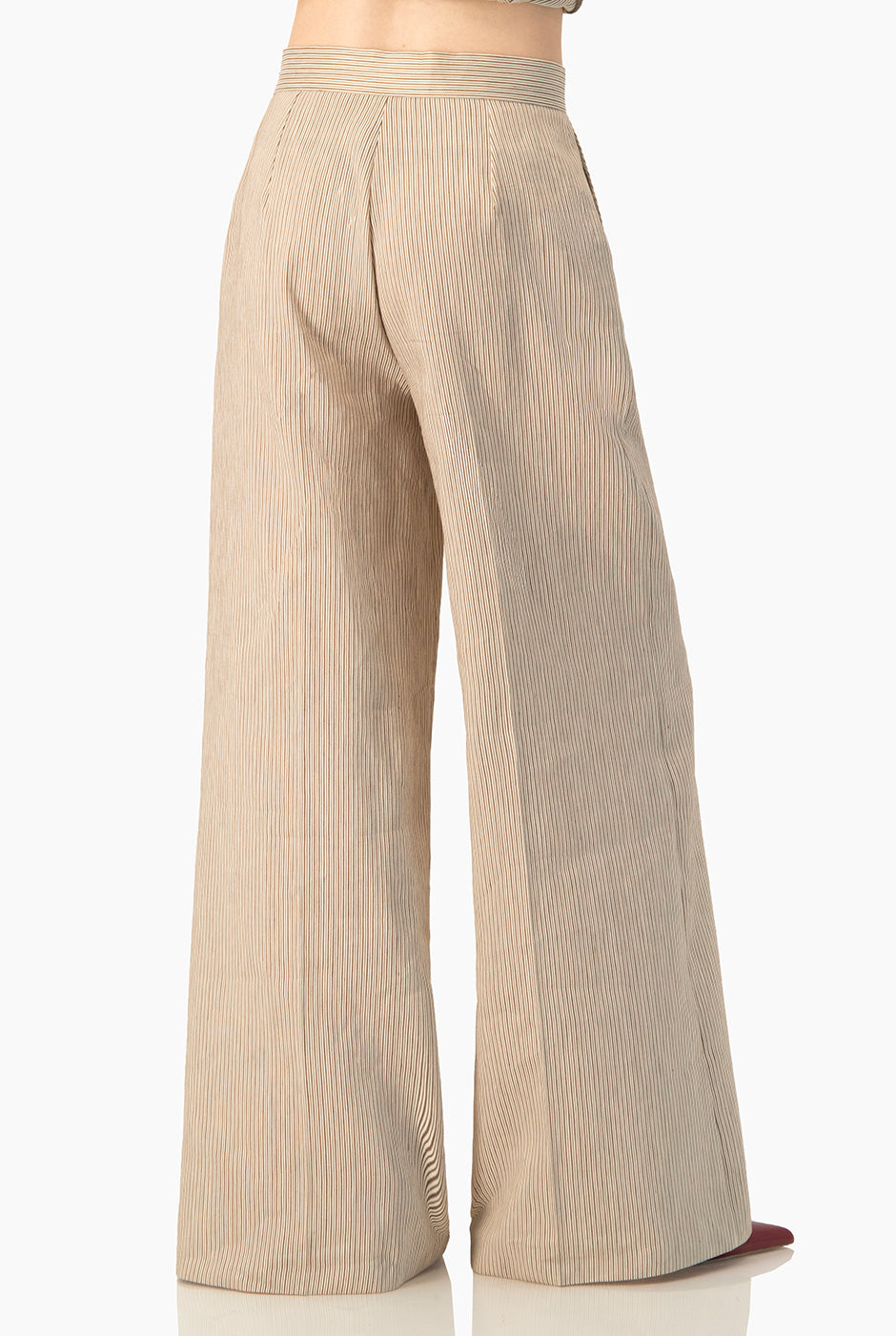 Pantalón Ivonne amplio rayado en beige con bolsillos laterales