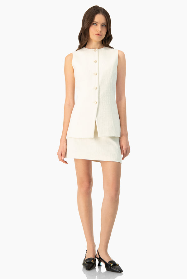 Chaleco en tono marfil