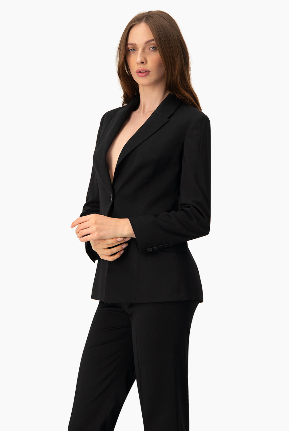 Saco negro cruzado con botones y bolsillos