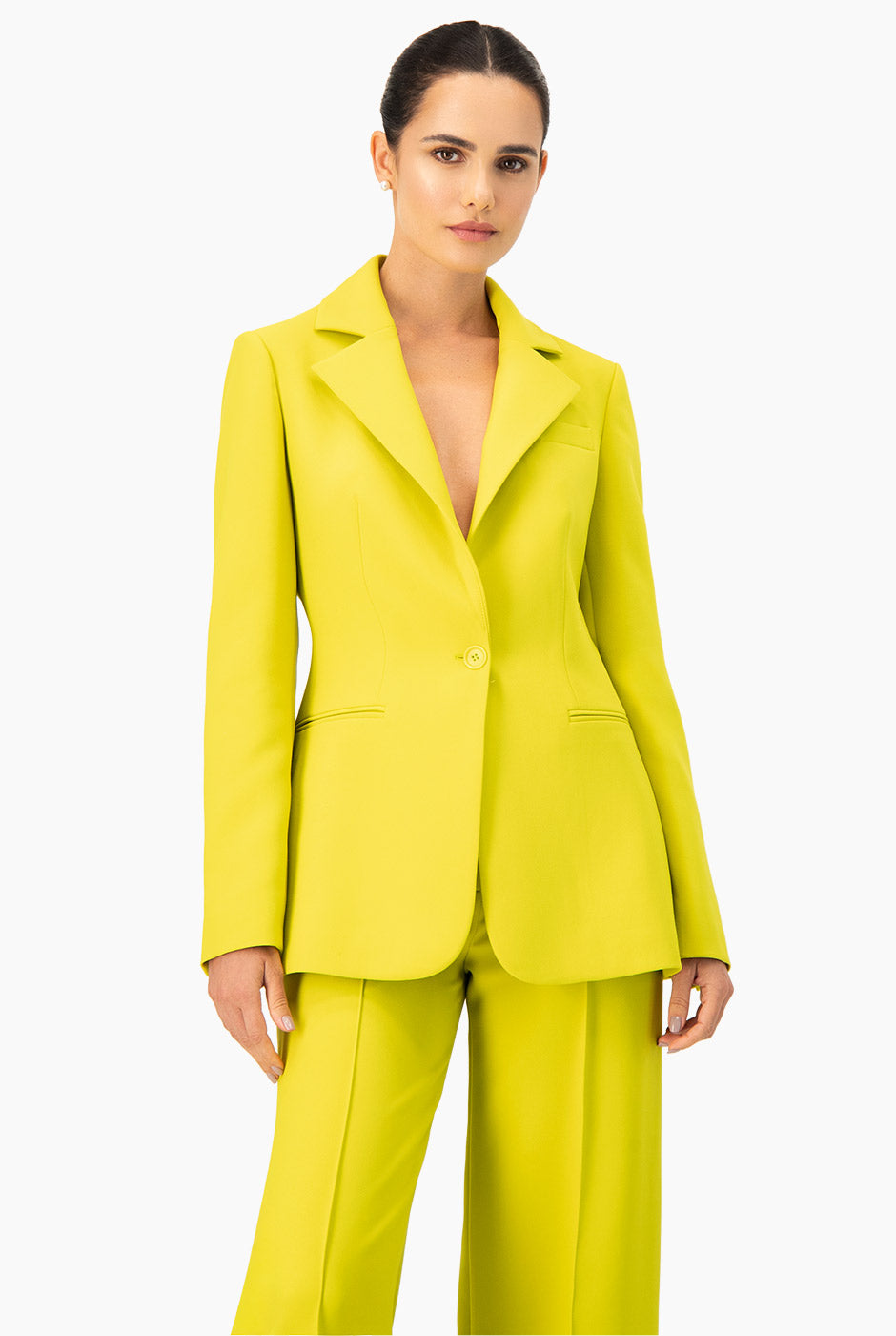 Saco sastreado verde con solapa y bolsillos