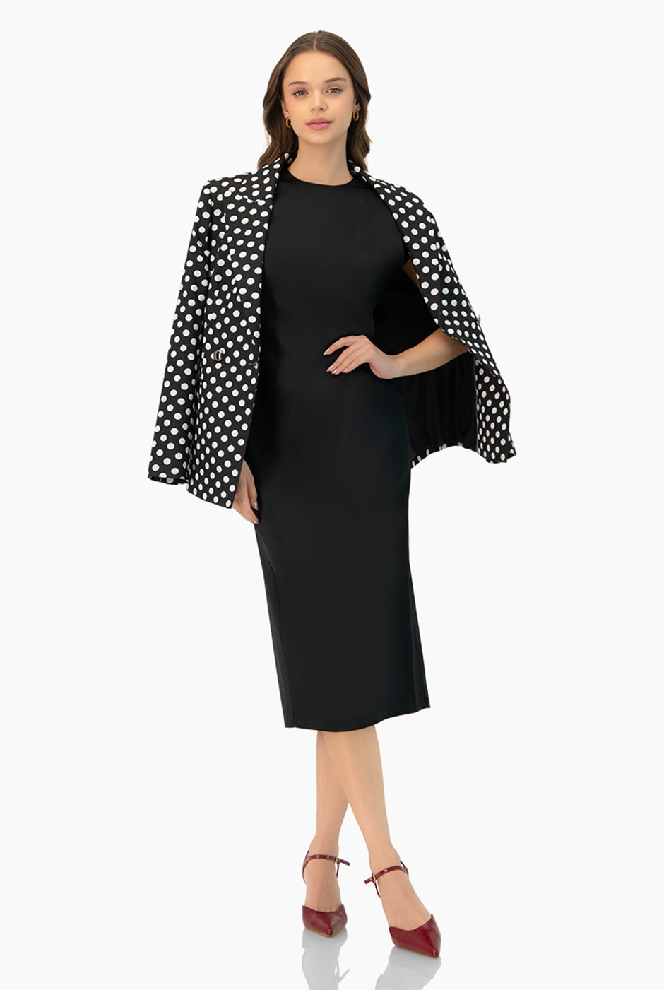 Saco cruzado negro con lunares y doble botón frontal