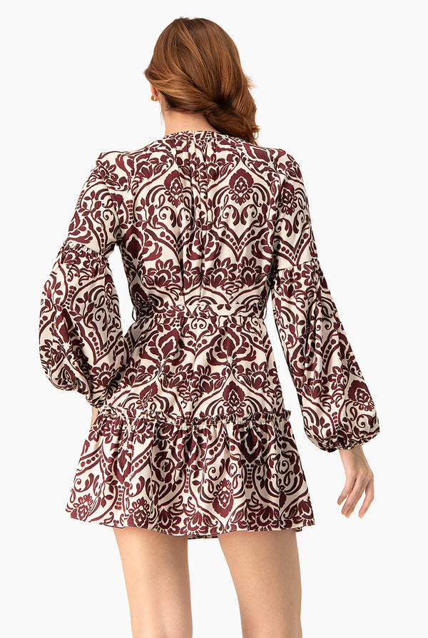 Vestido corto estampado manga larga