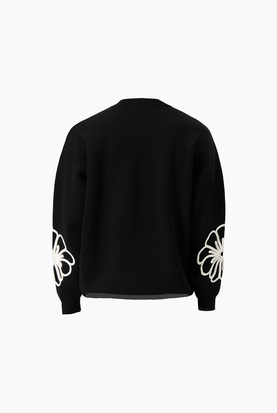 Pullover negro con cinta decorativa en contraste y estampado floral