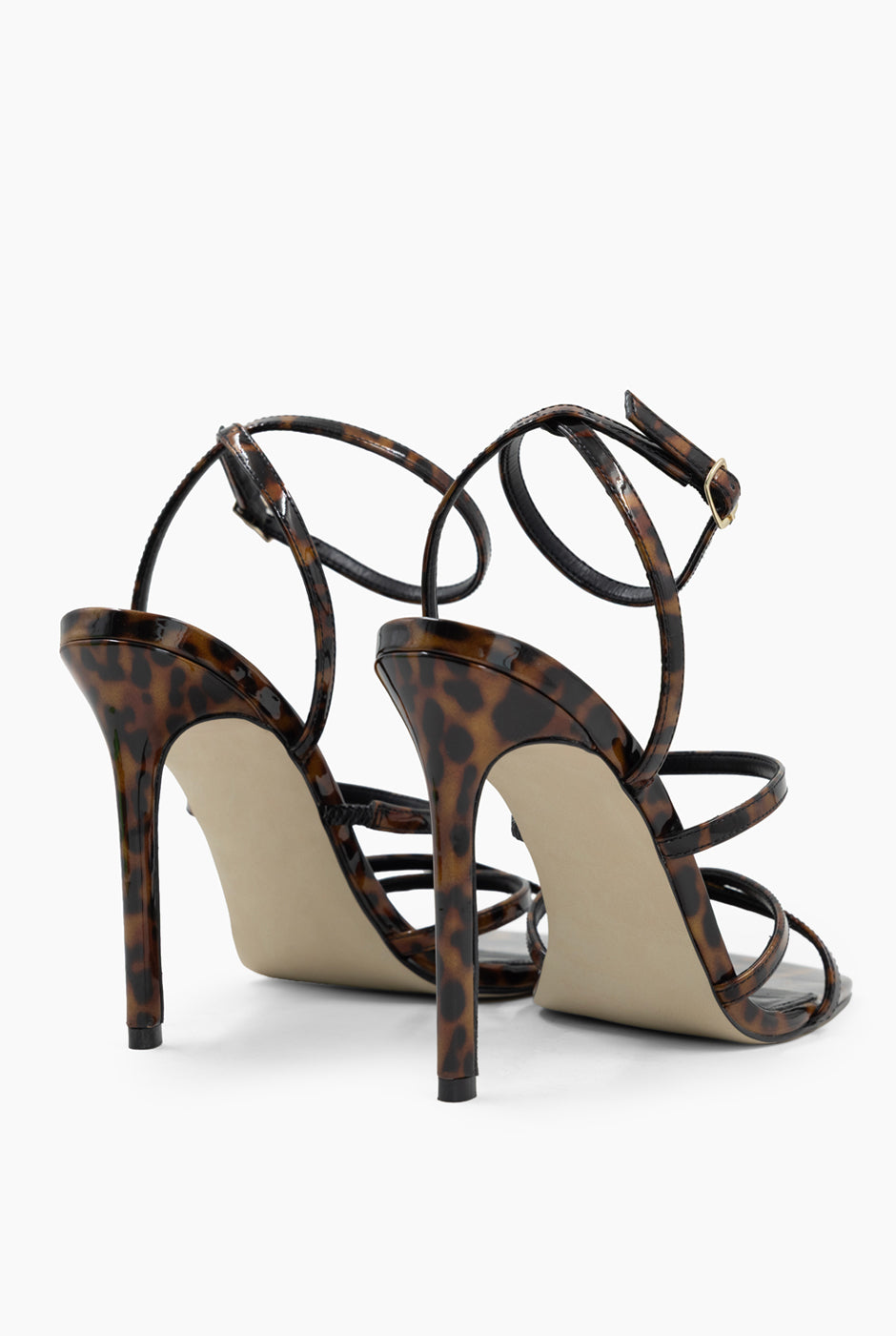 Sandalia Carey de cuero en estampado animal con tacón stiletto
